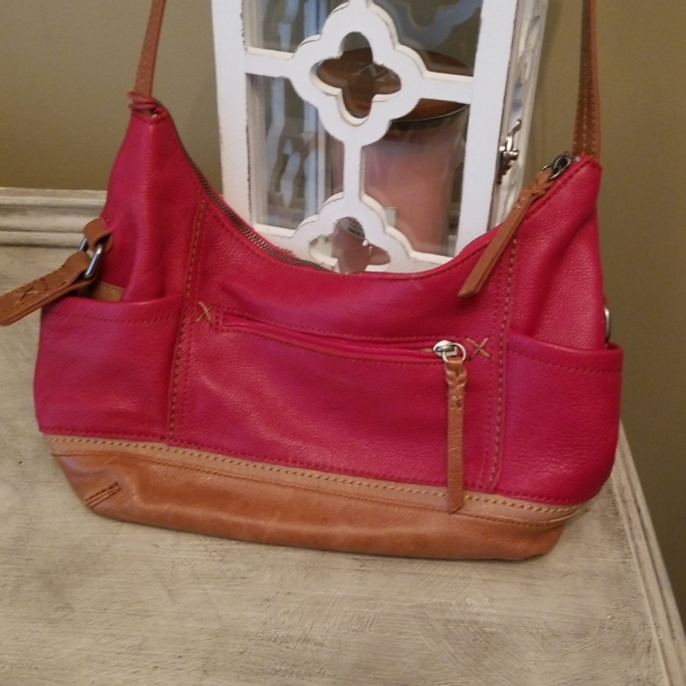 Hot pink and brown leather purse.